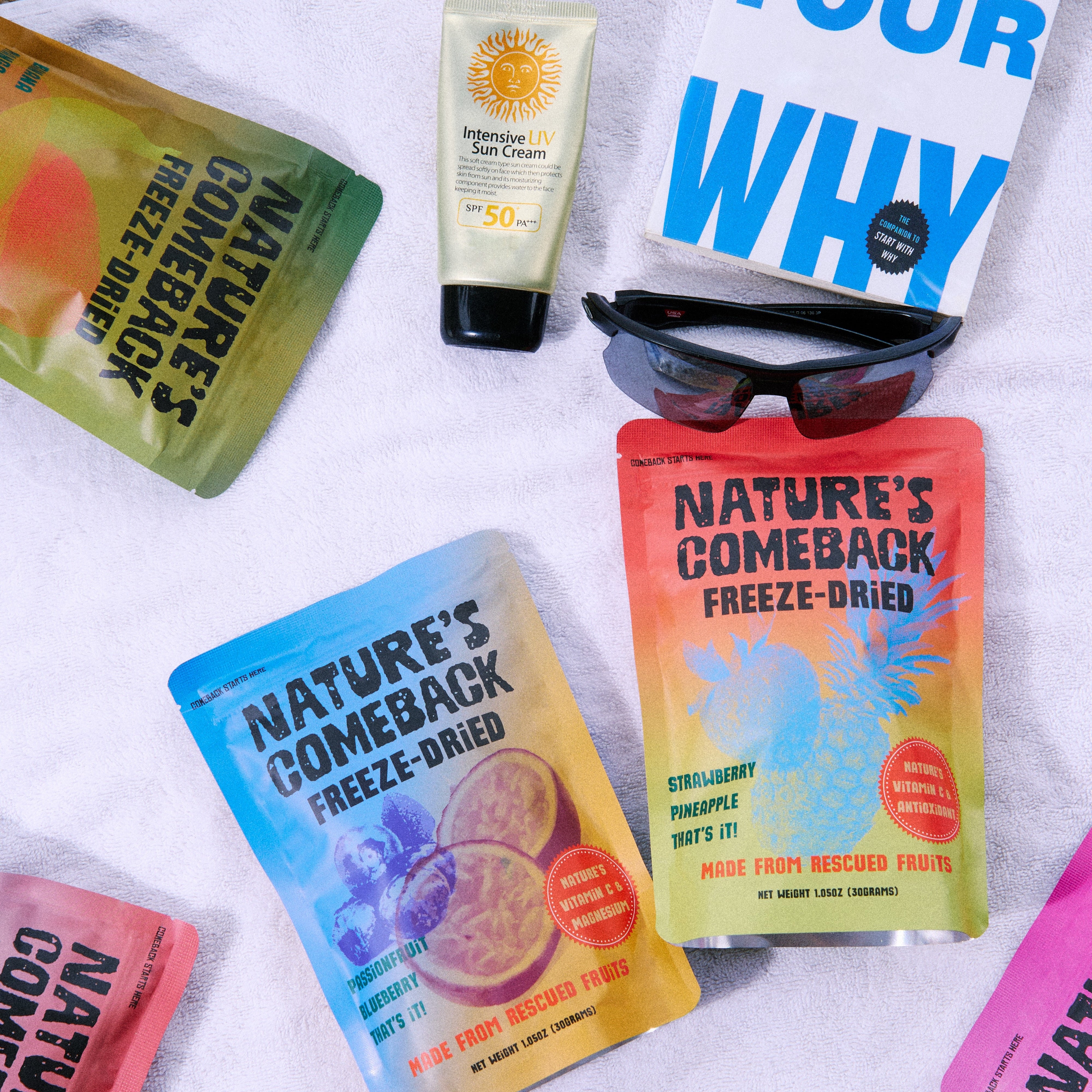 Nature's Comeback freeze-dried packages on a beach towel